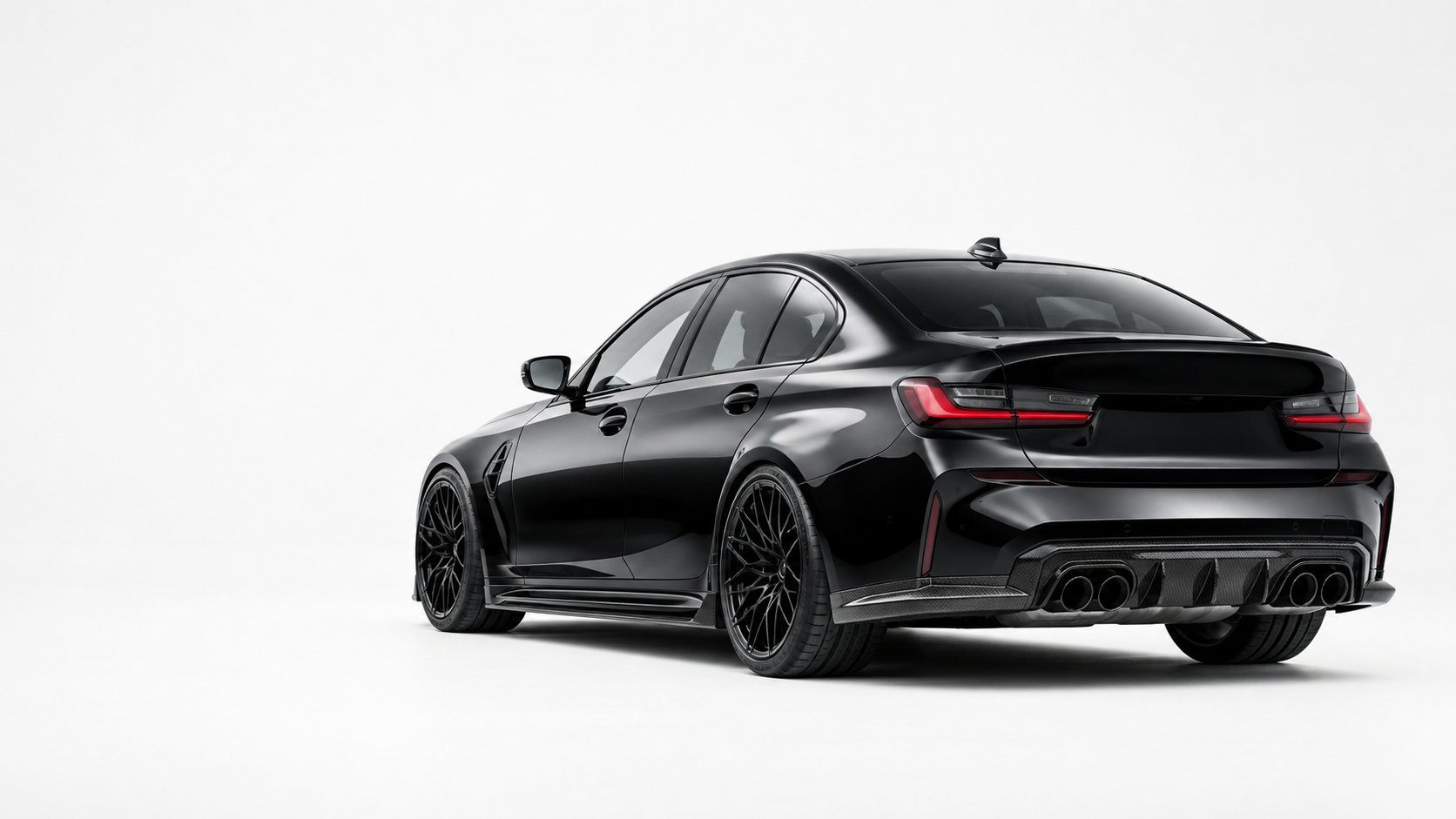 Black performance sedan shown in a clean studio