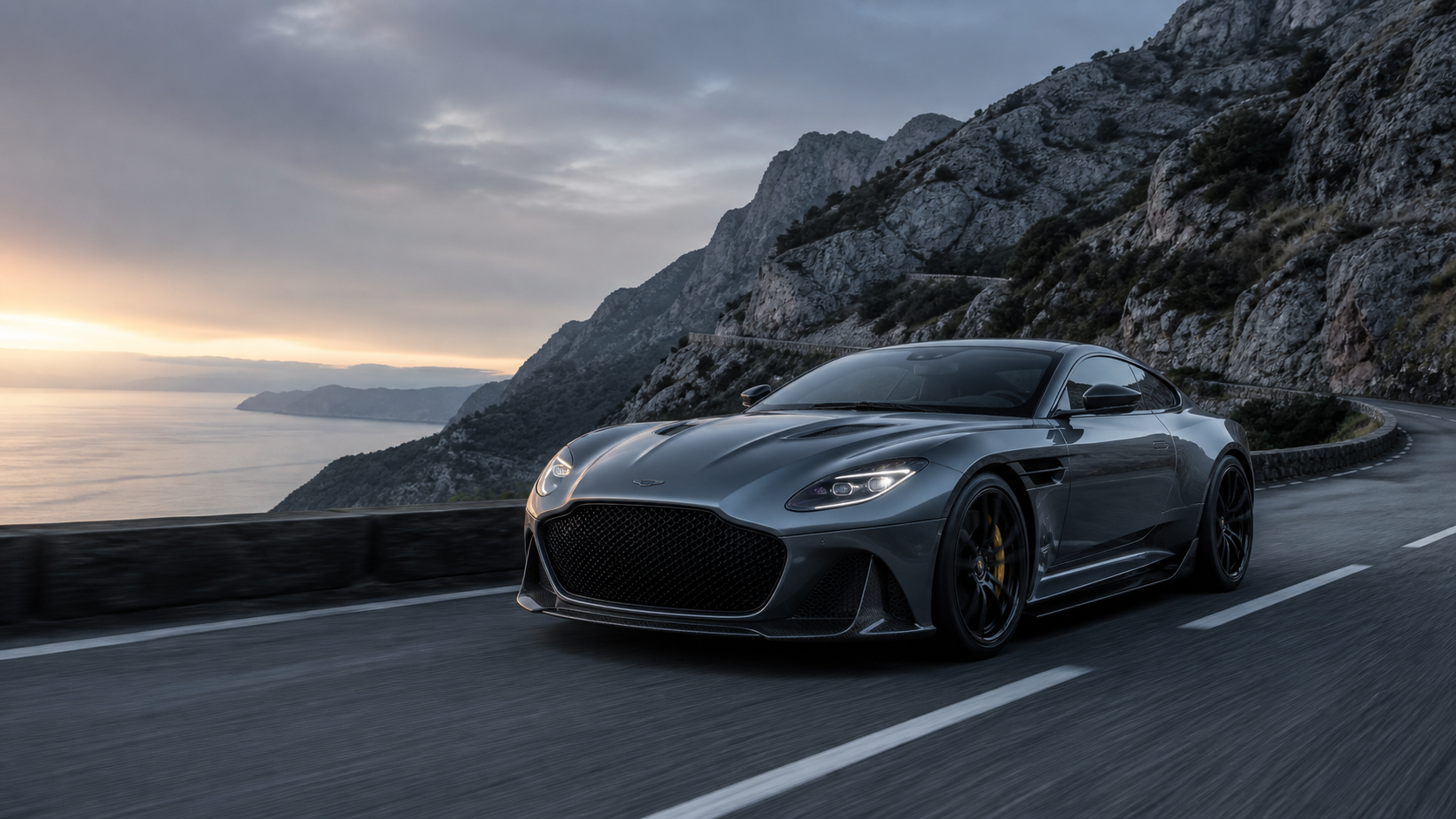 Grand tourer on a coastal road
